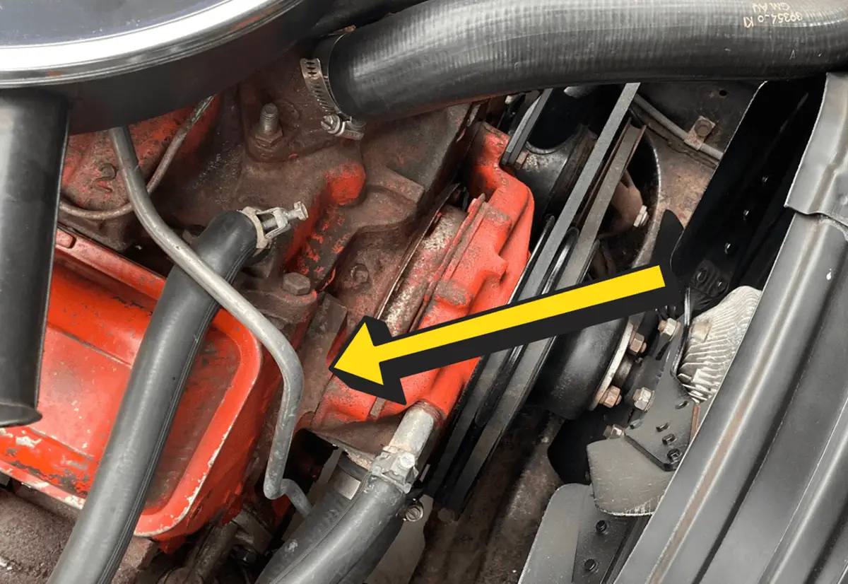 Chevrolet engine code location on front passenger side near water pump mount