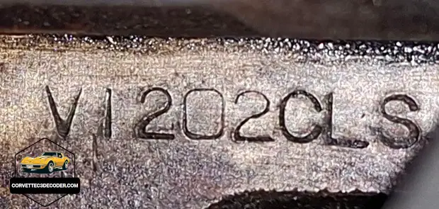 1976 Corvette C3 engine code stamping on block Close-up of the engine code stamping on a 1976 Chevrolet Corvette C3 L48 engine block
