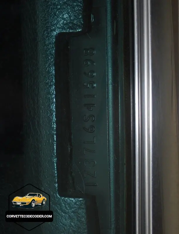 1976 Chevrolet Corvette C3 VIN plate close-up Close-up of the 1976 Chevrolet Corvette C3 Vehicle Identification Number (VIN) plate on the driver’s side windshield pillar